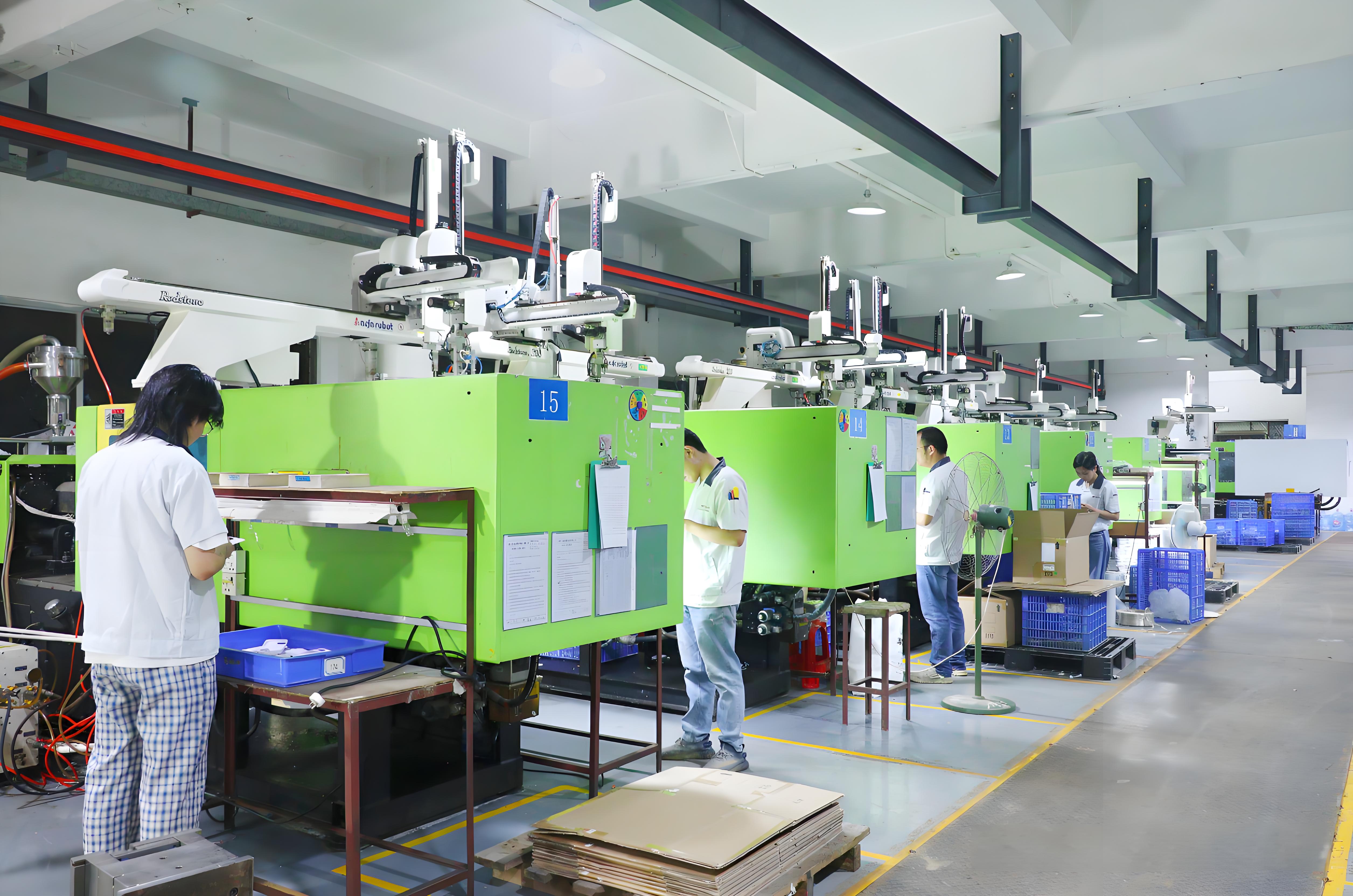 Injection molding production line with multiple machines and operators inspecting and managing processes in a factory setting.