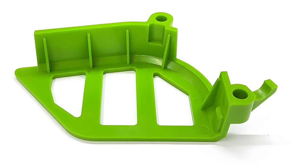 Bright green plastic component with angular shape and multiple cutouts