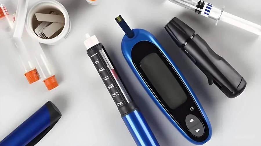 Collection of medical devices for diabetes management including a blood glucose meter, lancing device, insulin pen, syringe, containers, and test strips