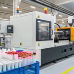 A high-tech injection molding machine in action.