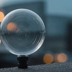 Close-up of a high-transparency injection molded plastic component showing clear, bubble-free surface.