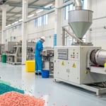 A clean industrial facility with advanced machinery for raw material preparation