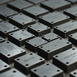 Close-up of injection mold steel samples illustrating different hardness grades