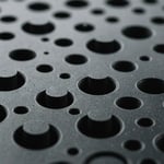 Injection molded product with visible dark spots