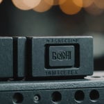 Close-up view of injection molded part showing gate marks.