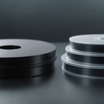 Various plastic materials suitable and unsuitable for injection molding displayed.