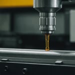 Close-up of an injection molding machine with a focus on the nozzle