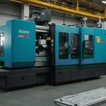 Injection molding machine with a visible short shot defect in the molded part