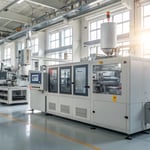 A multi-stage injection molding machine in a manufacturing facility