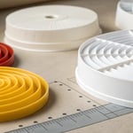 Technical illustration of various runner designs in a mold