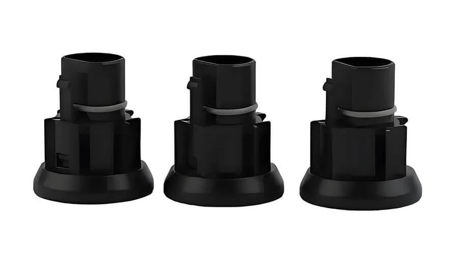 Three identical black cylindrical components in a line