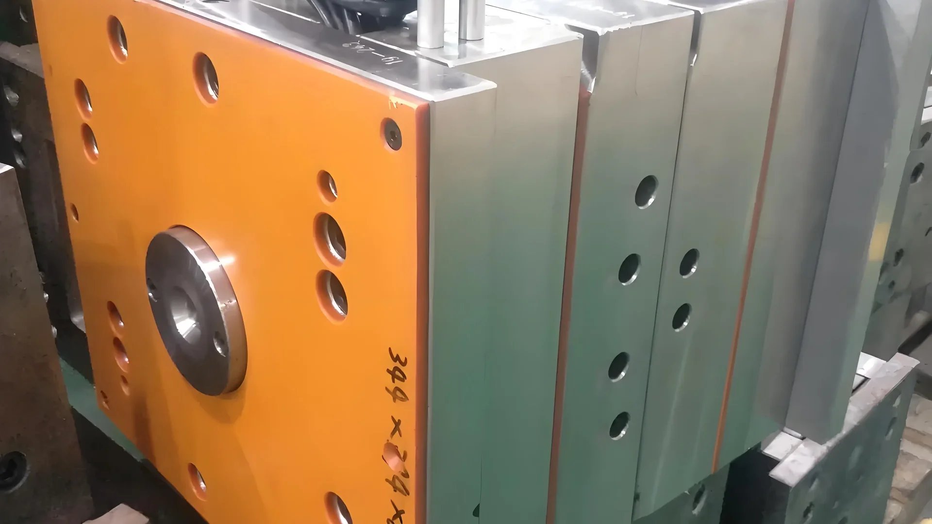 Hot Runner Mold System Close-up of a hot runner mold system with molten plastic