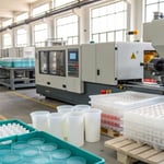 Injection molding machine in a factory