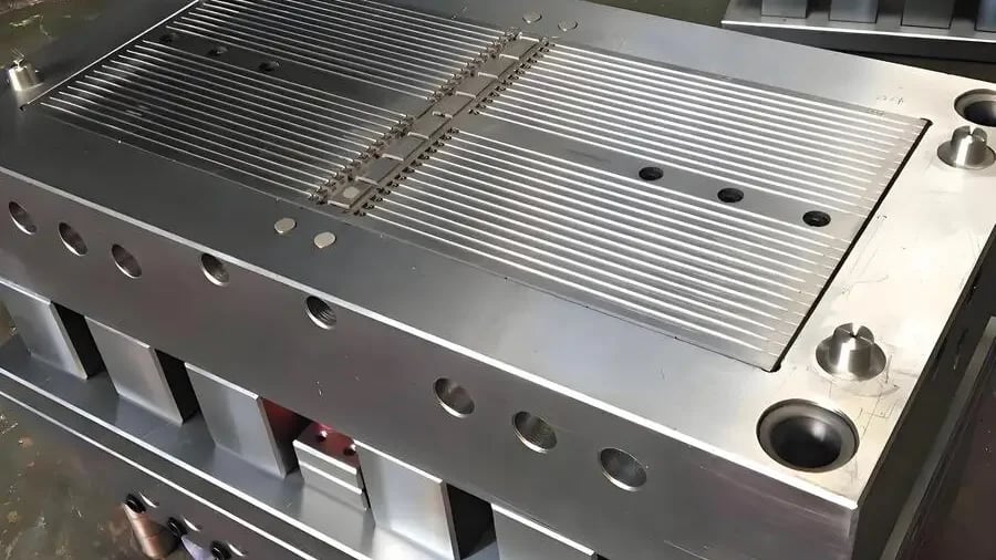 Close-up of a metallic cable tie mold